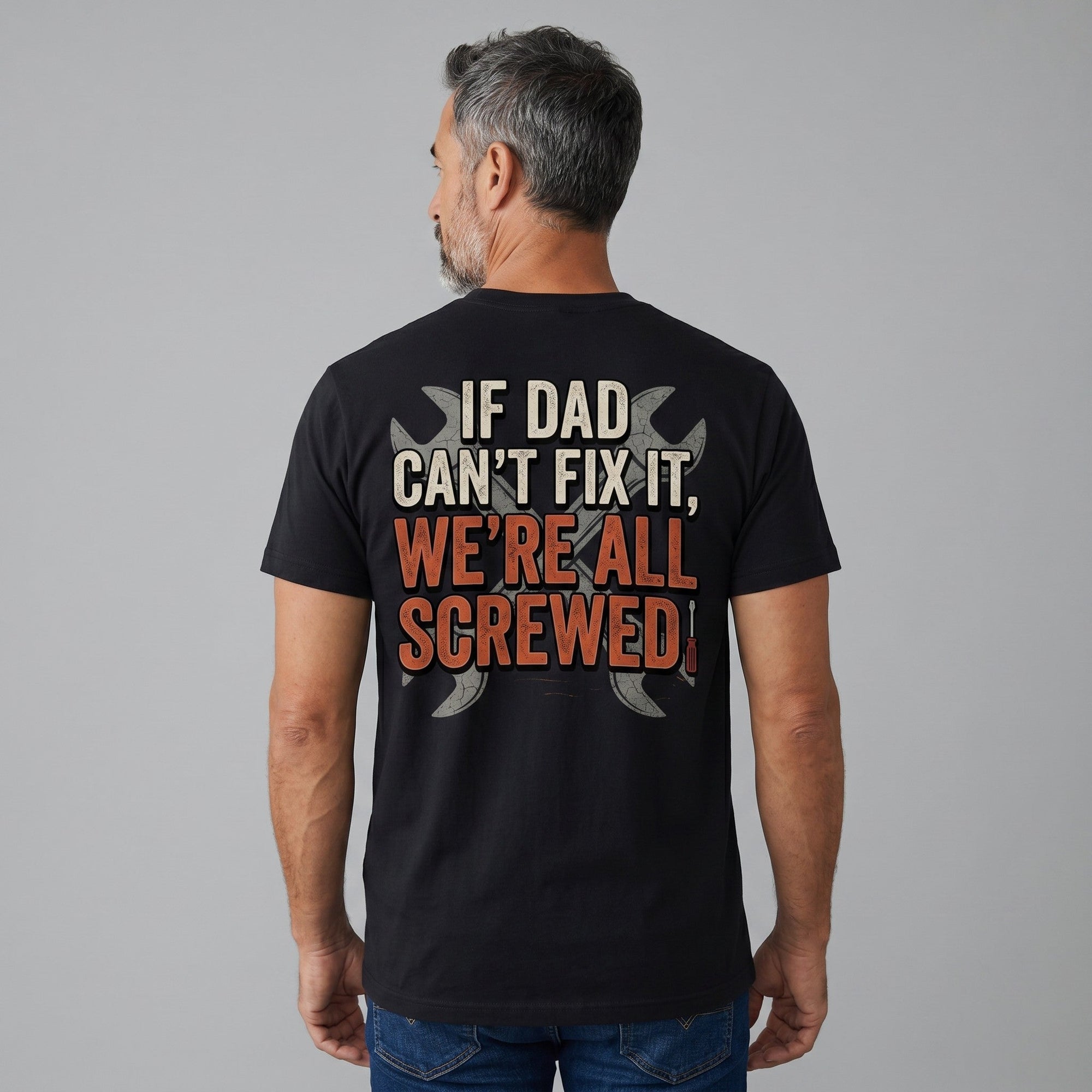 TrendyShift.Com black unisex crew neck t-shirt with Dad's Repair Shop graphic on back worn by a man from behind